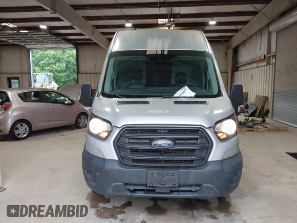 2020 Ford Transit Cargo with VIN 1FTBR1X82LKA53226, listed as a IAAI auction lot 42355465 with 49,579 mi miles and . Bid and sale history available at DreamBid. Image 13.