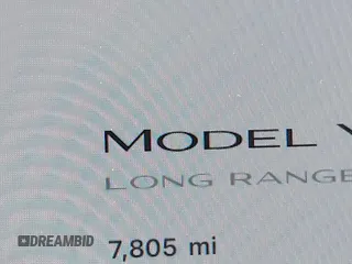 2024 Tesla Model Y with VIN 7SAYGDED9RF191453, listed as a IAAI auction lot 42272051 with 7,805 mi miles and . Bid and sale history available at DreamBid. Image 16.