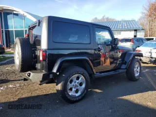 2014 Jeep Wrangler Sahara with VIN 1C4AJWBG9EL102983, listed as a Copart auction lot 84501554 with 120,372 mi miles and Salvage Title. Bid and sale history available at DreamBid. Image 3.