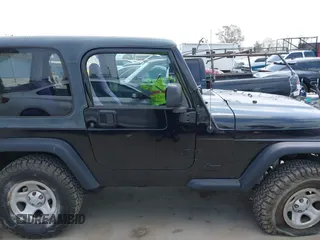 2002 Jeep Wrangler X with VIN 1J4FA39S32P738246, listed as a IAAI auction lot 42106359 with 266,993 mi miles and . Bid and sale history available at DreamBid. Image 13.