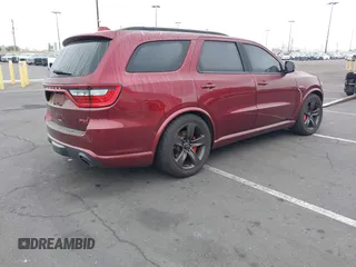 2018 Dodge Durango SRT with VIN 1C4SDJGJ5JC291287, listed as a IAAI auction lot 41862178 with 70,294 mi miles and . Bid and sale history available at DreamBid. Image 4.