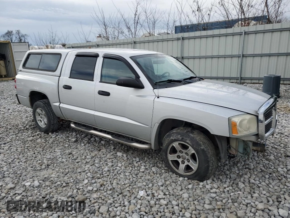 2007 Dodge Dakota SLT with VIN 1D7HW48P97S197684, listed as a Copart auction lot 86328944 with 122,969 mi miles and Salvage Title. Bid and sale history available at carsss.com. Image 4.
