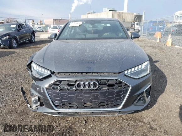 2022 Audi A4 S line Premium Plus z VIN WAUEAAF41NN015360, wystawiony jako IAAI lot #41320262 z przebiegiem 63 275 mil mil oraz . Historia ofert i sprzedaży dostępna na DreamBid. Obrazek 12.