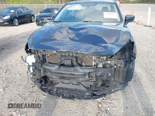 2015 Mazda 3 i Sport with VIN 3MZBM1U7XFM223093, listed as a IAAI auction lot 42020422 with 80,773 mi miles and . Bid and sale history available at carsss.com. Image 6.