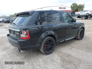 2013 Land Rover Range Rover Sport SC with VIN SALSH2E48DA802796, listed as a IAAI auction lot 41613187 with 104,024 mi miles. Bid and sale history available at carsss.com. Image 4.