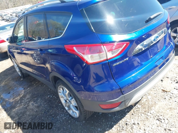 2015 Ford Escape Titanium with VIN 1FMCU0J93FUC20745, listed as a IAAI auction lot 41781551 with 174,538 mi miles and . Bid and sale history available at DreamBid. Image 3.