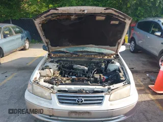 2001 Toyota Camry CE with VIN JT2BG22K010570556, listed as a IAAI auction lot 42458031 with 357,046 mi miles and . Bid and sale history available at DreamBid. Image 6.