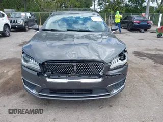 2017 Lincoln MKZ Hybrid Premiere с VIN 3LN6L5KU7HR634671, выставлен на аукционе IAAI как лот 42074134 с пробегом 105 850 миль миль и . История ставок и продаж доступна на DreamBid. Изображение 6.