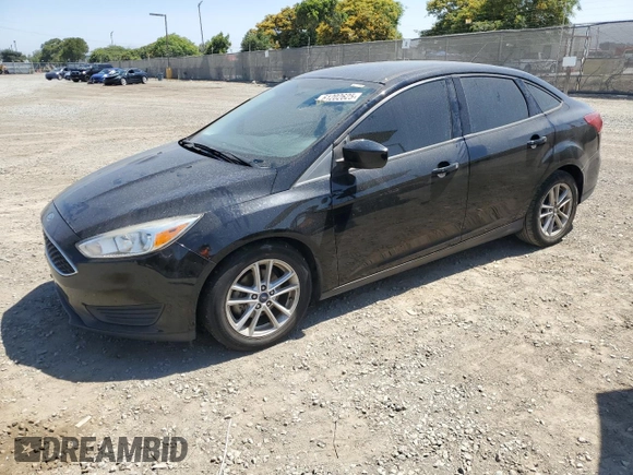 2018 Ford Focus SE z VIN 1FADP3FE0JL293485, wystawiony jako Copart lot #61202625 z przebiegiem 91 025 mil mil oraz Szkoda całkowita • Salvage title. Historia ofert i sprzedaży dostępna na DreamBid. Obrazek 1.