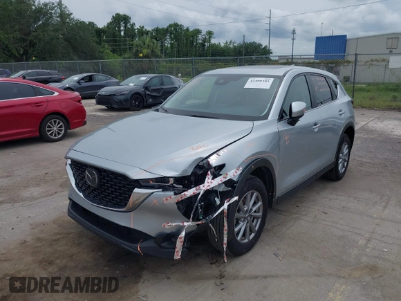 2023 Mazda CX-5 S Carbon Edition z VIN JM3KFBCM3P0197796, wystawiony jako IAAI lot #42408301 z przebiegiem 46 169 mil mil oraz . Historia ofert i sprzedaży dostępna na DreamBid. Obrazek 6.
