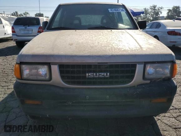 1997 Isuzu Rodeo z VIN 4S2CK58EXV4301951, wystawiony jako Copart lot #67468714 z przebiegiem 234 738 mil mil oraz Czysty tytuł • Clean title. Historia ofert i sprzedaży dostępna na DreamBid. Obrazek 5.