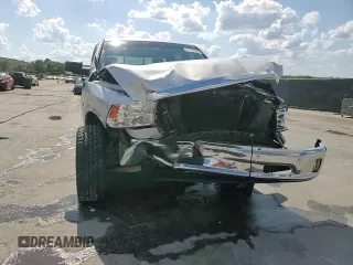 2015 Ram 1500 Big Horn z VIN 1C6RR6LT1FS676130, wystawiony jako Copart lot #57112565 z przebiegiem 113 575 mil mil oraz Szkoda całkowita • Salvage title. Historia ofert i sprzedaży dostępna na DreamBid. Obrazek 14.