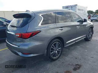 2016 Infiniti QX60 with VIN 5N1AL0MM1GC510760, listed as a IAAI auction lot 41990248 with 60,296 mi miles and . Bid and sale history available at DreamBid. Image 4.