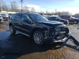 2021 Cadillac XT4 AWD Premium Luxury with VIN 1GYFZDR47MF023253, listed as a Copart auction lot 86620904 with 36,712 mi miles and Salvage Title. Bid and sale history available at carsss.com. Image 4.