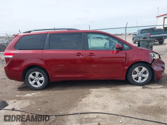 2014 Toyota Sienna LE AAS with VIN 5TDKK3DC4ES462090, listed as a IAAI auction lot 41942354 with 215,814 mi miles. Bid and sale history available at carsss.com. Image 13.