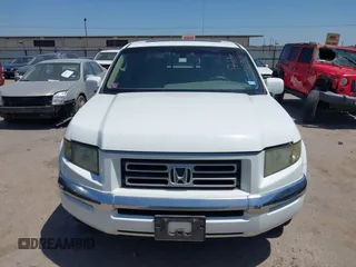 2008 Honda Ridgeline RTL z VIN 2HJYK16568H529221, wystawiony jako IAAI lot #42027640 z przebiegiem 143 536 mil mil oraz . Historia ofert i sprzedaży dostępna na DreamBid. Obrazek 12.