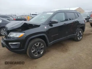 2018 Jeep Compass Trailhawk with VIN 3C4NJDDB6JT207289, listed as a Copart auction lot 56013675 with 83,385 mi miles and Salvage title. Bid and sale history available at DreamBid. Image 1.
