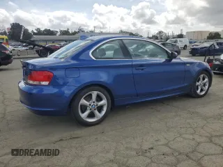 2009 BMW 1 Series 128i with VIN WBAUP93529VF49255, listed as a Copart auction lot 51100045 with 153,841 mi miles and Clean title. Bid and sale history available at DreamBid. Image 3.