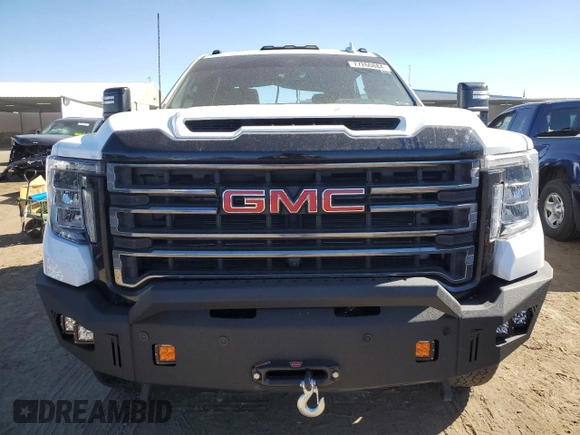 2023 GMC Sierra 3500HD AT4 z VIN 1GT49VEY3PF245031, wystawiony jako Copart lot #77260884 z przebiegiem Nie podano mil oraz Szkoda całkowita • Salvage title. Historia ofert i sprzedaży dostępna na DreamBid. Obrazek 5.