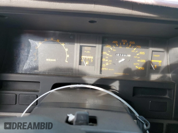 1987 Nissan Hardbody E z VIN JN6ND11SXHW014073, wystawiony jako Copart lot #78956934 z przebiegiem 381 885 mil mil oraz Szkody całkowita. Historia ofert i sprzedaży dostępna na DreamBid. Obrazek 9.