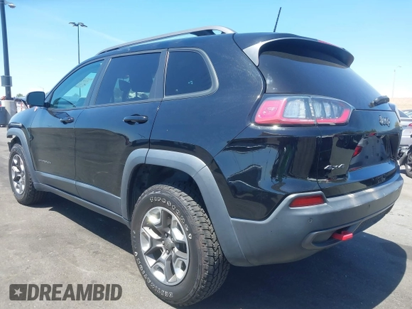2019 Jeep Cherokee Trailhawk with VIN 1C4PJMBXXKD433284, listed as a IAAI auction lot 42020051 with 57,089 mi miles and . Bid and sale history available at DreamBid. Image 3.