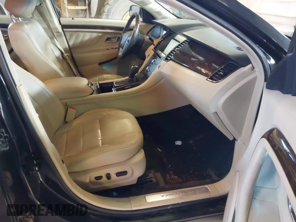 2015 Ford Taurus Limited with VIN 1FAHP2J87FG172580, listed as a IAAI auction lot 41891567 with 183,784 mi miles. Bid and sale history available at carsss.com. Image 5.