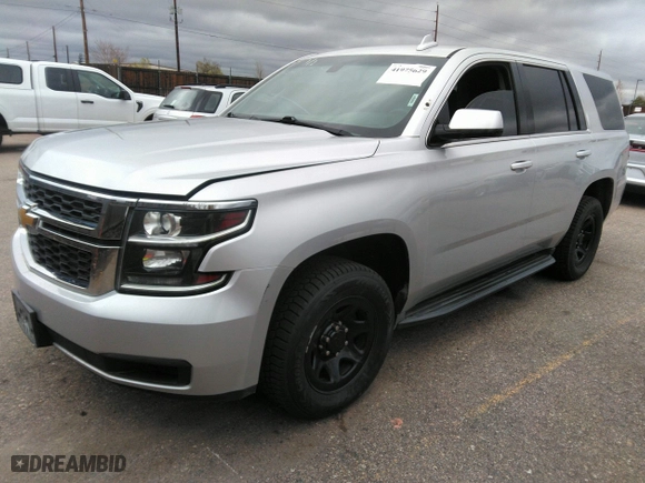 2016 Chevrolet Tahoe Commercial with VIN 1GNSKDEC5GR368328, listed as a IAAI auction lot 41975629 with 104,205 mi miles. Bid and sale history available at carsss.com. Image 17.