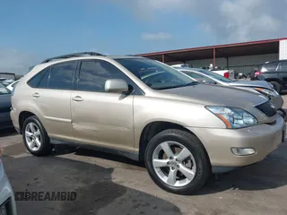2004 Lexus RX 330 z VIN 2T2GA31U84C016355, wystawiony jako IAAI lot #42504435 z przebiegiem 150 043 mil mil oraz . Historia ofert i sprzedaży dostępna na DreamBid. Obrazek 1.