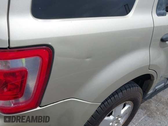 2012 Ford Escape XLT with VIN 1FMCU0D74CKA07739, listed as a IAAI auction lot 42100820 with 308,265 mi miles. Bid and sale history available at carsss.com. Image 12.