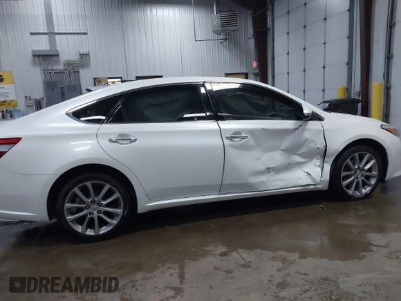 2014 Toyota Avalon Limited with VIN 4T1BK1EB6EU100635, listed as a IAAI auction lot 41609581 with 128,609 mi miles. Bid and sale history available at carsss.com. Image 13.