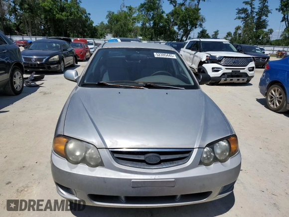 2004 Kia Spectra GS with VIN KNAFB161945141309, listed as a Copart auction lot 52395445 with 99,100 mi miles and Clean Title. Bid and sale history available at DreamBid. Image 5.