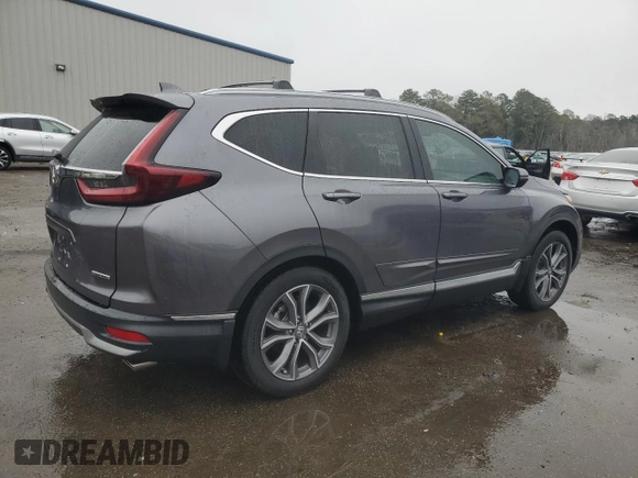 2021 Honda CR-V Touring with VIN 2HKRW1H96MH420465, listed as a Copart auction lot 86885384 with 61,699 mi miles and Salvage Title. Bid and sale history available at carsss.com. Image 3.