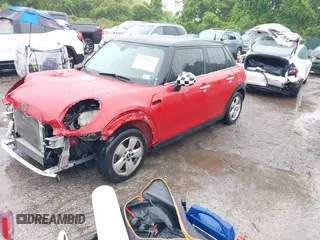 2017 MINI Hardtop 4 Door Cooper with VIN WMWXU1C58H2E18094, listed as a IAAI auction lot 42312473 with 50,482 mi miles and . Bid and sale history available at DreamBid. Image 18.