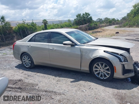 2014 Cadillac CTS Luxury RWD z VIN 1G6AR5SX4E0141195, wystawiony jako IAAI lot #42144565 z przebiegiem 80 267 mil mil oraz . Historia ofert i sprzedaży dostępna na DreamBid. Obrazek 12.