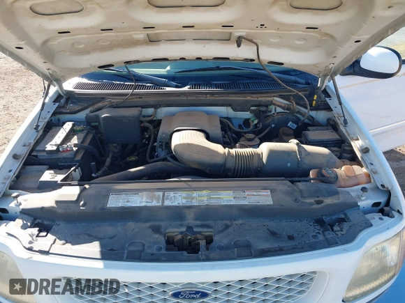 1998 Ford F-150 with VIN 1FTZX17W3WKB43668, listed as a IAAI auction lot 41243322 with 154,780 mi miles and . Bid and sale history available at DreamBid. Image 10.