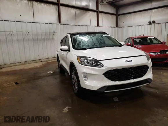 2020 Ford Escape Titanium Hybrid с VIN 1FMCU9DZXLUC27803, выставлен на аукционе Copart как лот 43334755 с пробегом 135 001 миль миль и На запчасти • Non repairable. История ставок и продаж доступна на DreamBid. Изображение 14.