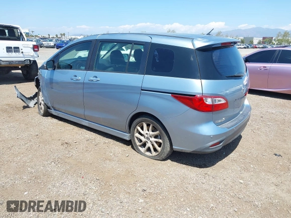 2013 Mazda 5 Touring with VIN JM1CW2CL8D0145628, listed as a IAAI auction lot 42148184 with 137,150 mi miles and . Bid and sale history available at DreamBid. Image 3.