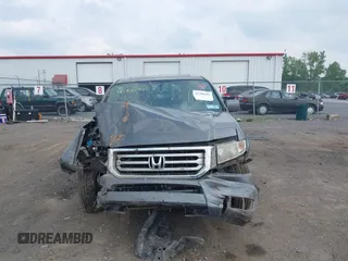 2013 Honda Ridgeline RTL with VIN 5FPYK1F56DB004834, listed as a IAAI auction lot 42706361 with 230,000 mi miles and . Bid and sale history available at DreamBid. Image 12.