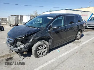 2014 Honda Odyssey EX-L with VIN 5FNRL5H6XEB129098, listed as a Copart auction lot 52211625 with Not Provided miles and Salvage Title. Bid and sale history available at carsss.com. Image 1.