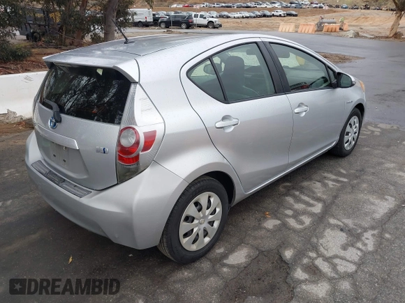 2014 Toyota Prius One with VIN JTDKDTB33E1067408, listed as a IAAI auction lot 41573895 with 245,383 mi miles and . Bid and sale history available at DreamBid. Image 4.