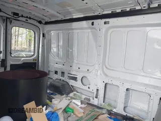 2021 Ford Transit Cargo with VIN 1FTBR1C85MKA48173, listed as a IAAI auction lot 42005472 with 81,980 mi miles and . Bid and sale history available at DreamBid. Image 8.