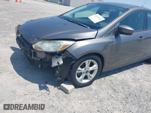 2012 Ford Focus SE z VIN 1FAHP3K28CL229646, wystawiony jako IAAI lot #42491915 z przebiegiem 174 105 mil mil oraz . Historia ofert i sprzedaży dostępna na DreamBid. Obrazek 13.