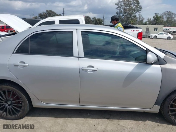 2010 Toyota Corolla with VIN 1NXBU4EE2AZ185716, listed as a IAAI auction lot 41909937 with 158,459 mi miles. Bid and sale history available at carsss.com. Image 13.