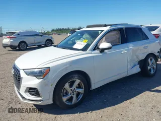 2021 Audi Q3 Premium with VIN WA1AUCF32M1097059, listed as a IAAI auction lot 41825132 with 66,144 mi miles and . Bid and sale history available at DreamBid. Image 17.
