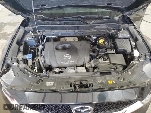 2017 Mazda CX-5 Sport with VIN JM3KFBBL7H0124764, listed as a Copart auction lot 42599395 with 96,749 mi miles and Non Repairable. Bid and sale history available at carsss.com. Image 12.