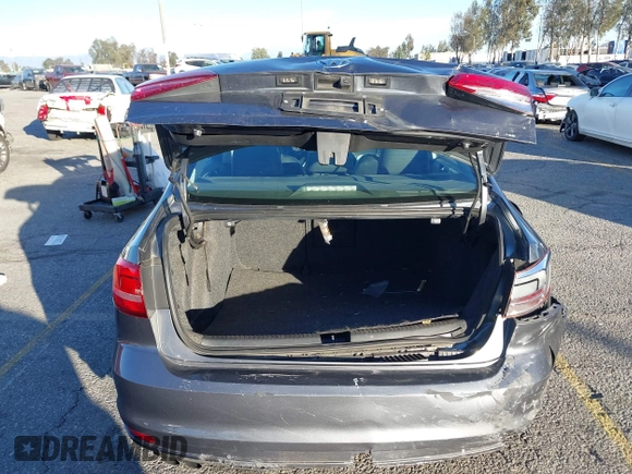 2015 Volkswagen Jetta Sport with VIN 3VWD17AJ2FM318669, listed as a IAAI auction lot 41266868 with 124,539 mi miles and . Bid and sale history available at DreamBid. Image 16.