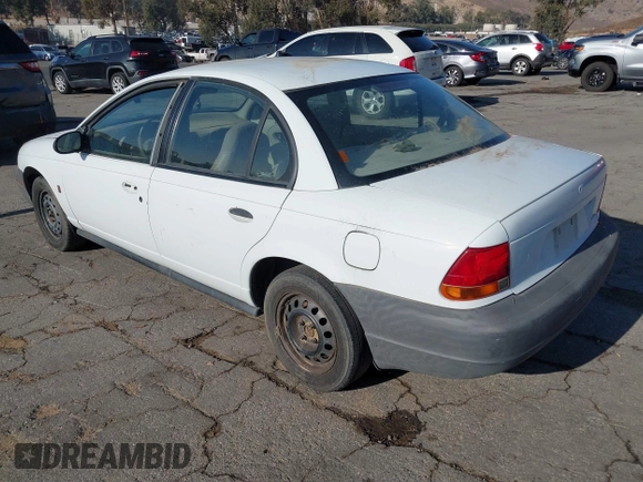 1998 Saturn SL z VIN 1G8ZG5283WZ233209, wystawiony jako IAAI lot #40997373 z przebiegiem 240 385 mil mil oraz . Historia ofert i sprzedaży dostępna na DreamBid. Obrazek 3.