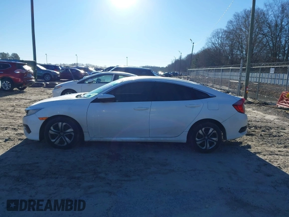 2017 Honda Civic LX z VIN 19XFC2F50HE007646, wystawiony jako IAAI lot #41360121 z przebiegiem 133 800 mil mil oraz . Historia ofert i sprzedaży dostępna na DreamBid. Obrazek 14.
