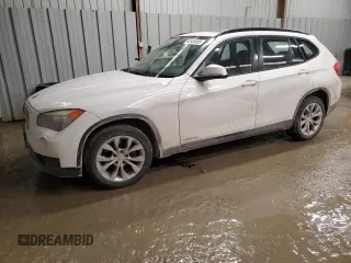 2014 BMW X1 xDrive28i with VIN WBAVL1C57EVY14339, listed as a Copart auction lot 42933495 with 121,026 mi miles and Salvage Title. Bid and sale history available at carsss.com. Image 1.