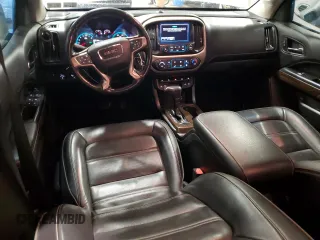 2018 GMC Canyon 4WD Denali z VIN 1GTG6EEN6J1171037, wystawiony jako Copart lot #52521865 z przebiegiem 99 931 mil mil oraz Szkoda całkowita • Salvage title. Historia ofert i sprzedaży dostępna na DreamBid. Obrazek 8.